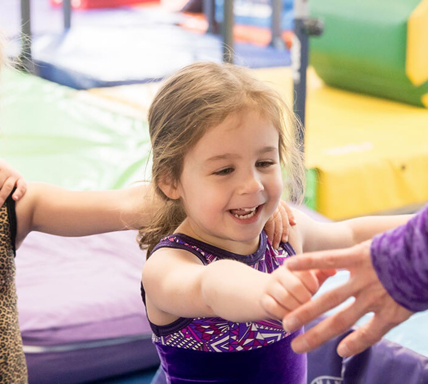 Gymnastics East students practicing class skills