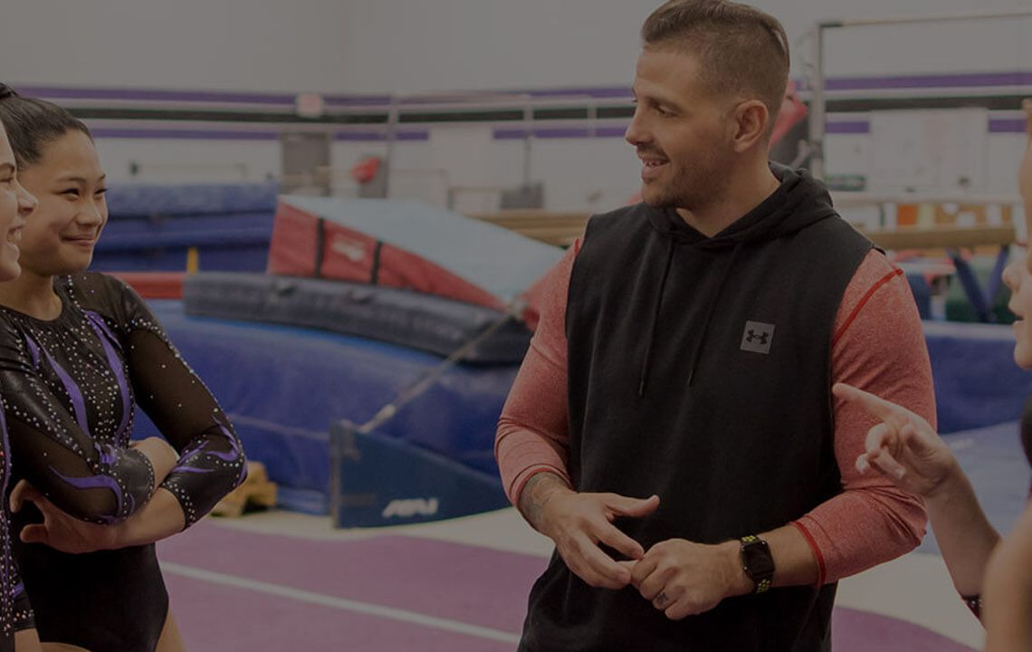 Gymnastics East coaches working with athletes