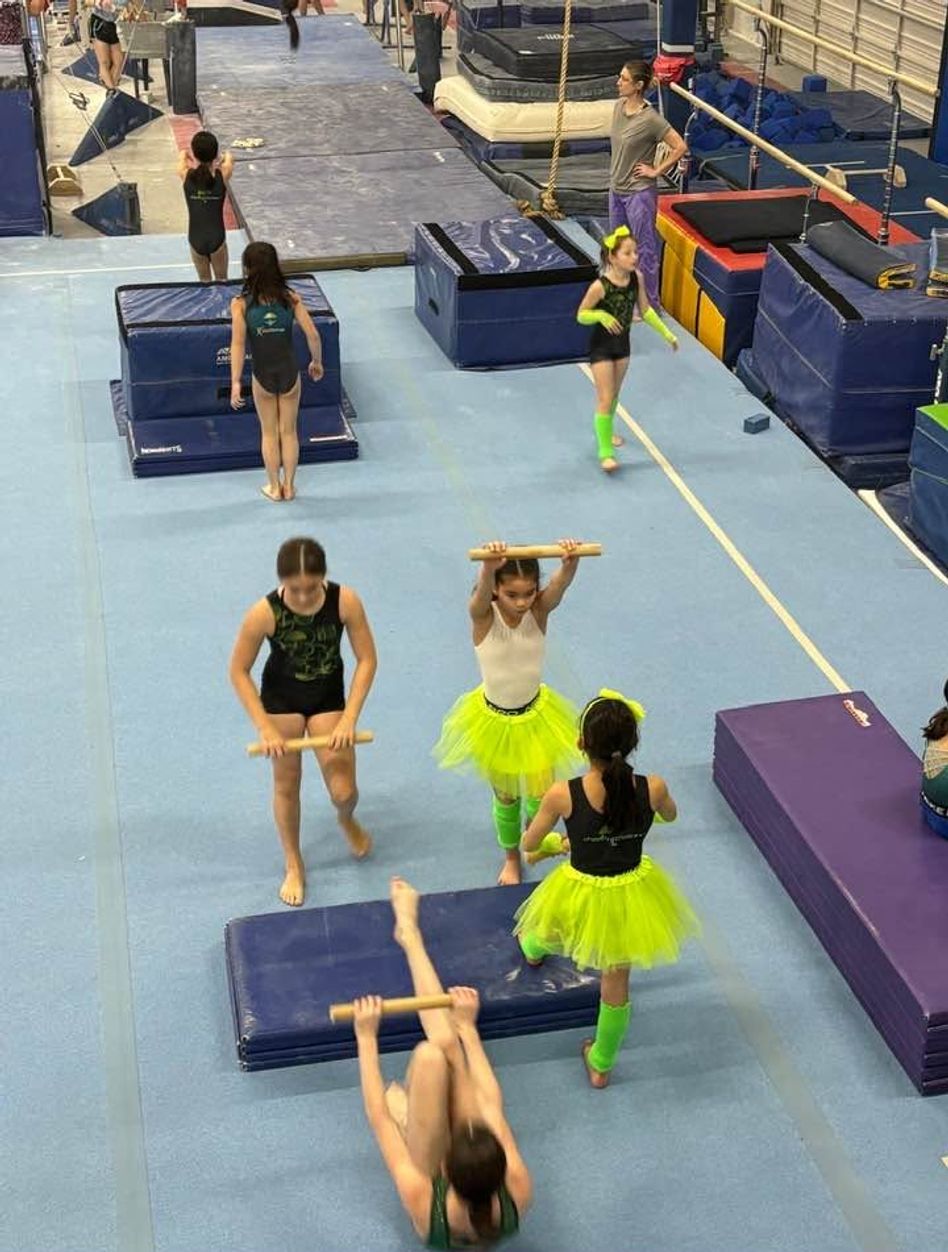 Children practicing gymnastics during Open Gym